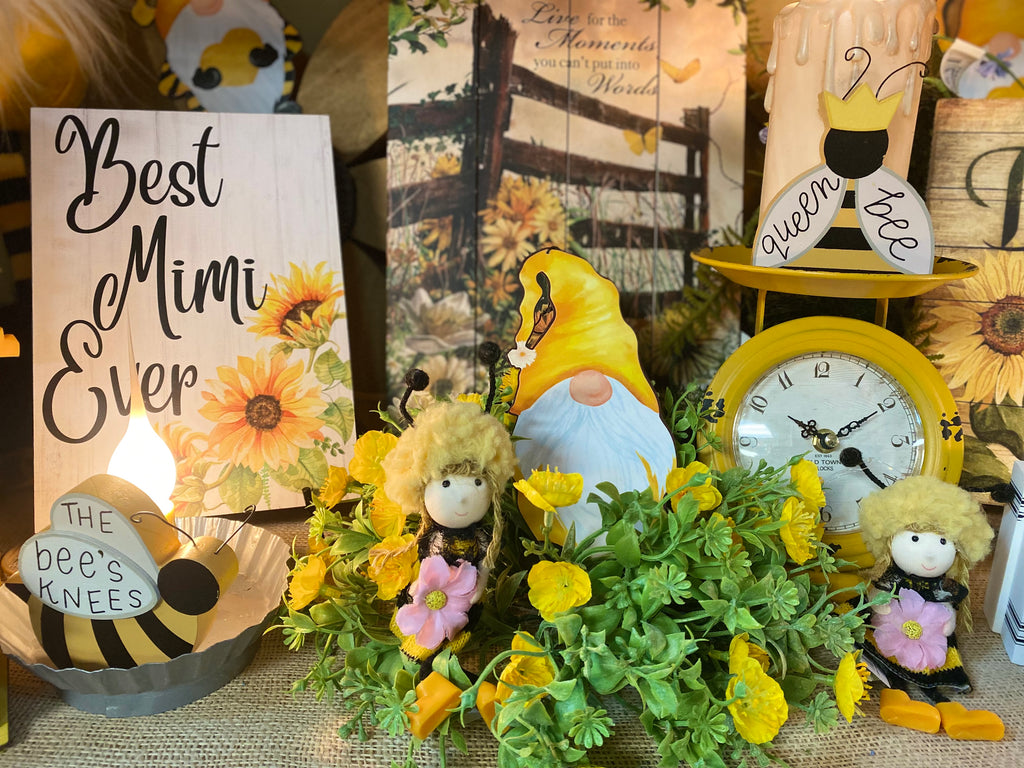 Mimi, Queen Bee, Gnomes, and Sunflowers